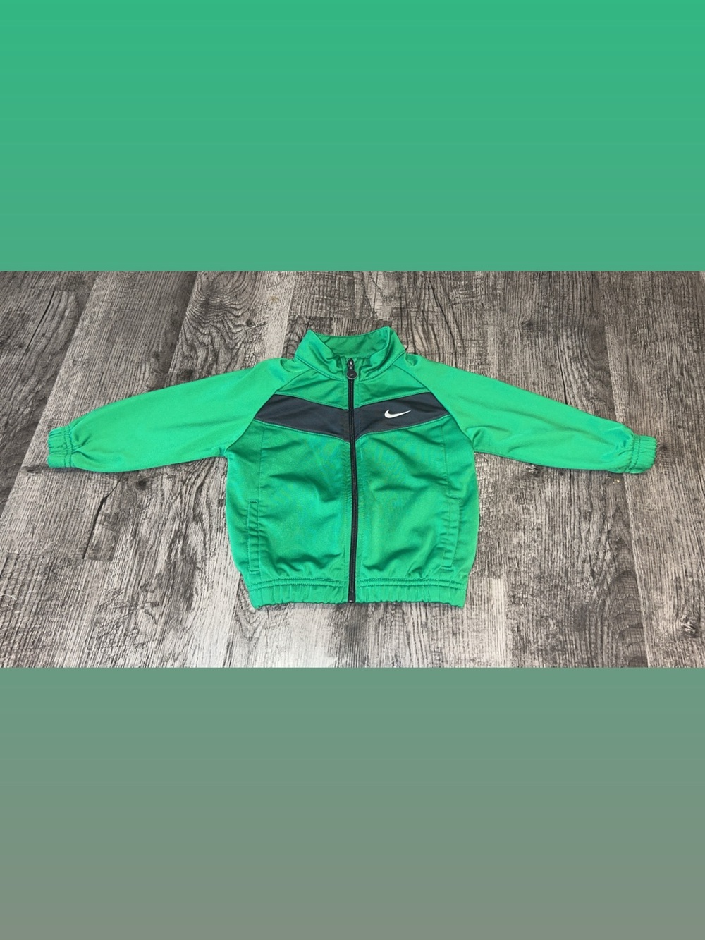 Nike Toddler Green Jacket with Black Trim and White Swoosh